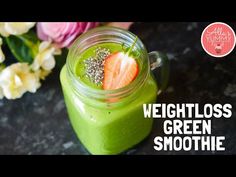 a green smoothie with strawberries and chia seeds