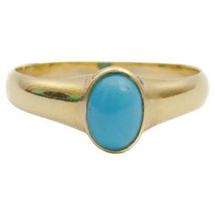 A lovely turquoise ring set in a gold band. The turquoise stone is oval shaped and set in a high polished 14 karat gold frame. The gold of the ring has a small openwork design on both sides of the stone. It is said that turquoise connect heaven and earth and help you connect to the spiritual world. Turquoise can strengthen your connection to intuition, and it is also helpful for protection and purification. This is a very delicate piece of jewelry that enhances femininity and elegance. The ring Spiritual World, Heaven And Earth, Vintage Turquoise, Favorite Rings, Gold Band, Cluster Ring, Turquoise Stone, Solitaire Ring, Gold Bands