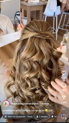 a woman is getting her hair done in the salon