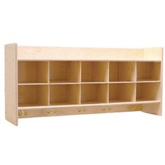 a wooden shelf with several compartments on it