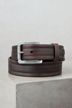 The Parker American Bison Leather belt is the essential accessory that creates a big effect. For starters, there's the genuine American bison leather that's rich with natural undertones, giving this robust belt plenty of depth. Its tapered-tip design features a heavy contrast stitch, and the detachable antique silver plated roller buckle and keeper for a cool rustic effect. And a full-grain leather gives this premium belt a pliable thickness for a comfort fit and a great looking belt that lasts. Bison Leather, American Bison, Belt Style, American Spirit, Leather Care, Contrast Stitch, Military Fashion, Belt Size, Full Grain Leather