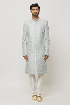 Grey blue sherwani embroidered with lotus patterns, embellished by crystals and sequin. Comes with a churidar. - Aza Fashions Designer Embellished Sherwani For Diwali, Fitted Sherwani With Mirror Work, Embellished Sherwani For Diwali, Fitted Sherwani With Mirror Work For Eid, Embellished Unstitched Sherwani For Eid, Bollywood Style Fitted Sherwani With Mirror Work, Embellished Sherwani For Diwali Festive Occasion, Embellished Sherwani For Diwali Festivities, Festive Embellished Sherwani For Diwali