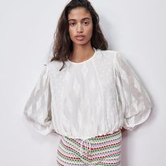 Zara Embroidered Shirt Xlarge Blogger Favorite- Sold Out, Round Neck Shirt With Long Sleeves And Elastic Cuffs. Tonal Embroidered Detail. Adjustable Drawstring Hem. Back Opening With Button Closure. Color Oyster White | 3440/047 Condition: Nwt, New Approx Measurements: Length: 19” Pit To Pit: 24.5” Oversized Embroidered White Top, Zara White Embroidered Summer Top, Zara Bohemian Embroidered Blouse, Zara Embroidered Shirt, White Zara Embroidered Top, Zara Embroidered Top, Zara Embroidered V-neck Blouse, White Embroidered Blouse, Ruffle Collar Blouse