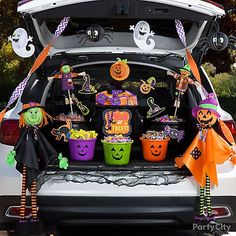 the trunk of a car decorated for halloween