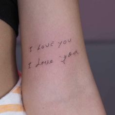 a woman's arm with writing on it that says i love you, i don't you