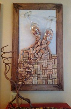 a wine cork art is hanging on the wall