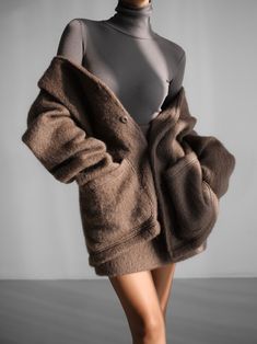 Oversized luxe cardigan with a splendid combination of wool and mohair to create a warm and chic cardigan. Soft to touch. Excellent warmth. Model is in MINUSEY ONE SIZE. ✔️ Free worldwide express shipping over $100✔️ Loved by 6,500+ customers✔️ Limited edition collections, maximum style⠀⠀⠀⠀⠀⠀⠀⠀⠀Stay ahead of the trend with can’t-find-anywhere-else staples. Your closet will thank you 💕* MINUSEY ONE SIZE = EU 34-36, US 2-6* 70% Wool / 20% Mohair / 10% Nylon* Dry clean* Made in Korea - Model Height: 172cm/5'7" (US 2, EU 34) Brown Cashmere Sweater Coat For Winter, Mohair Outerwear For Fall, Mohair Outerwear For Fall Layering, Soft Mohair Outerwear For Fall, Winter Oversized Cashmere Sweater Coat, Mohair Cardigan With Soft Texture For Winter, Winter Mohair Cardigan With Soft Texture, Winter Mohair Cardigan, Chic Oversized Wool Cardigan