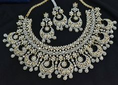 A beautiful elegant American diamond choker with earrings pressing type back and mang teeka,24ct gold plated Indian Bridal Choker, Bridal Choker, Diamond Choker, American Diamond, Bridal Jewelry Sets, Indian Bridal, Real Diamonds, Indian Jewelry, Layered Necklaces