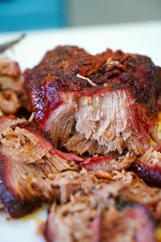 the meat is sliced up and ready to be served on the plate with other food items