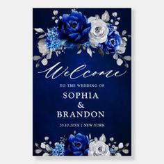 a blue and white wedding welcome card with flowers on the front, in silver foil