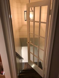 an open door leading to a hallway in a house