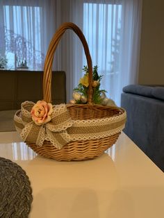 a wicker basket sitting on top of a table