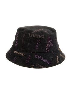 Grey and multicolor denim Chanel bucket hat with logo print throughout. From the Spring 2022 collection Designer Spring Bucket Hat With Short Brim, Trendy Curved Brim Hat With Logo, Trendy Summer Bucket Hat With Embroidered Logo, Trendy Cotton Hat With Logo Print, Spring Hats With Logo Print And Curved Brim, Trendy Bucket Hat With Embroidered Logo, Trendy Letter Print Bucket Hat, Chanel Bucket Hat, Denim Chanel