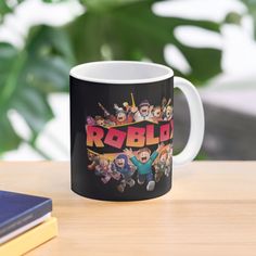 11oz ceramic mug featuring wraparound print. Available in two shapes. Dishwasher safe. Step into the world of endless possibilities with our exclusive Roblox T-shirt! Perfect for gamers and creators alike, this shirt is designed to celebrate your love for one of the most popular online gaming platforms. Featuring vibrant graphics and iconic Roblox imagery, this T-shirt is a must-have for any true fan. Roblox T Shirt, Roblox T-shirt, Online Gaming, Endless Possibilities, A Coffee, Ceramic Mug, Most Popular, Dishwasher Safe, Coffee Mugs