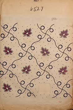 an old book with floral designs on it