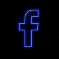 the facebook logo is lit up in blue