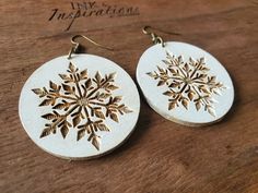 Boho Snowflake earrings are handmade wood earrings with a boho vibe. These are a perfect holiday look with these chic snowflake shape wood earrings. Laser-engraved from hardwood and hand-painted in a rustic white, these ightweight dangle earrings bring a boho-modern twist to your wardrobe. Available in sizes of 40mm, 50mm, and 60mm, they make an ideal gift for the special woman in your life. The unique texture and color of these earrings creates an elegant statement that will draw compliments wh Wood Dangle Earrings, Handmade Dangle Earrings, Snowflake Shape, Snowflake Earrings, Boho Modern, Great Gifts For Women, Holiday Earring, Rustic White, Christmas Earrings