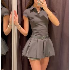 Mini Dress With Buttoned Lapel Collar And Short Sleeves. Belt With Metal Buckle. Skirt With Voluminous Box Pleats And Matching Fabric. Side Hidden In-Seam Zip Closure. Charcoal Gray | 3152/313 Outer Shell 96% Cotton 4% Elastane Ss24 3152/313 Women's Spring Fashion, Fashion Mini Dress, Buckle Skirt, Causal Dresses, Mini Dress Fashion, Box Pleats, Polo Dress, Polo Collar, Club Dresses