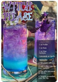 two purple and blue cocktails sitting on top of a table