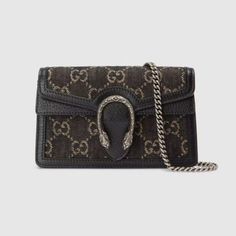 Reminiscent Of An Archival Symbol, The Textured Tiger Head Spur Is The Dionysus' Defining Feature. The Feline Appears Throughout The Universe, Expressing The House's Fascination With The Wild Beauty Of The Natural World. Here, The Antique Silver-Toned Hardware Is Paired With A Black And Ivory Gg Denim Jacquard. Gucci Mini Dionysus Shoulder Bag In Black Denim Black And Ivory Gg Denim Jacquard Black Leather Antique Silver-Toned Hardware Cotton Linen Lining Pin Closure With Side Release Pocket Unde Gucci Dionysus Super Mini, Mini Bag Black, Gucci Mini, Alternative Metal, Mini Cross, Black Bag, Gucci Dionysus, Chain Strap, Body Bag