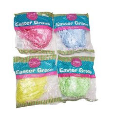 four bags of easter grass sitting on top of each other