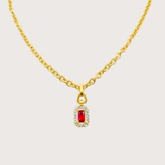 Our newest take on our Bella collection. Standout in this beautiful necklace - fashioning a durable golf chain, with a statement pendant - Made with our signature high-quality Red cubic zirconia stones and carefully plated with solid gold on stainless steel. Adjustable length of 15 to 18 inches.