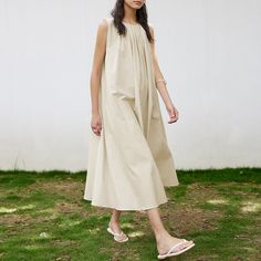 One size: Chest width:174cm, Length: 118cm, Shoulder: 35.7cm Sleeveless Beige Spring Dress, Beige Sleeveless Spring Dress, Sleeveless Beige Maxi Dress For Spring, Beige Sleeveless Sundress Maxi Dress, Beige Sleeveless Maxi Sundress, Beige A-line Sleeveless Sundress, Sleeveless Neutral Maxi Dress For Beach, Beige Sleeveless Sundress For Summer, Neutral Sleeveless Maxi Dress For Beach