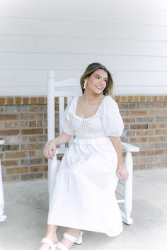 This stunning midi dress is perfect for the bride's special day. With its short puff sleeves and sweetheart neckline, it exudes elegance and femininity. The elastic detail and flowy, tiered design ensure a comfortable and flattering fit, while the stretchy fabric allows for ease of movement. A dreamy choice for any bride! model, Gracie is wearing a size small model, Julie is wearing a size small Puff Sleeve Midi Dress, Sleeve Midi Dress, White Midi Dress, Stretchy Fabric, Sweetheart Neckline, Puff Sleeves, Special Day, Puff Sleeve, Midi Dress