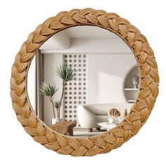 a mirror that is made out of some kind of wood and has a plant in it