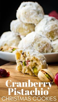 cranberry pistachio christmas cookies are stacked on a plate and ready to be eaten