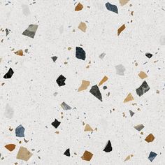 an abstract background with many different shapes and sizes on the surface in shades of brown, black, gray and white