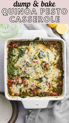 a casserole dish with spinach and cheese in it on a white table