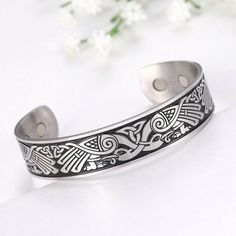 Stylish Steel, Timeless Titanium, Tough Tungsten. ​​​​​​​​​​​​​​Fantasy Forge Jewelry Celtic Falcon Bracelet Silver Stainless Steel Viking Norse Hawk Bird Cuff High Quality Fast & Free Shipping Hassle Free Returns In Celtic mythology the hawk is known as a strong omen, the hawk carries messages from the otherworlds The Celts also believed the hawk symbolized the need to examine your life, focus on what is positive, allow it to continue, and grow. The Celtic falcon cuff bracelet is made of solid Fantasy Forge, Hawk Bird, The Celts, Celtic Bracelet, Celtic Mythology, Viking Bracelet, Bangles Style, Metal Engraving, Celtic Jewelry