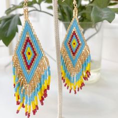 Add Some Refined Boho Vibes To Your Outfit With These Multicolor Seed Bead Tassel Earrings. Brand New Yellow Tassel Earrings For Festival, Yellow Fringe Earrings For Beach, Yellow Bohemian Adjustable Tassel Earrings, Blue Beaded Earrings With Gold Beads For Festivals, Bohemian Yellow Adjustable Tassel Earrings, Adjustable Yellow Bohemian Tassel Earrings, Bohemian Yellow Beaded Dangle Earrings, Yellow Bohemian Tassel Earrings, Yellow Bohemian Tassel Earrings For Beach