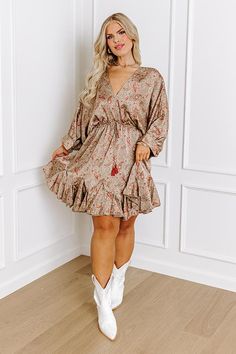 - This sweet dress has won our hearts! - Unlined lightweight material with a colorful abstract paisley print and a satin finish - A deep-v neckline - An open v-cut back with a tie detail - Long dolman sleeves with cuffs - A functioning drawstring waistline featuring accent tassels - A relaxed silhouette that ends in a ruffled mid-thigh length hemline Measurements 1XL : Bust 56", Hip 52", Length 37", Sleeve Length 22", Waist 50". 2XL : Bust 58", Hip 54", Length 38", Sleeve Length 23", Waist 52". Faux Leather Mini Dress, Abstract Paisley, Leather Mini Dress, Sweet Dress, V Cut, V Cuts, Colorful Abstract, Leather Mini, Dolman Sleeve