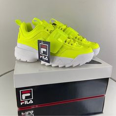 Brand New With Box, Women's Disruptor 2 Applique Sneakers In The Color Safety Yellow By Fila. Sz 8 The Disruptor 2 Sneaker Featuring A Thick Midfoot Strap. Leather / Textile / Synthetic Large Applique Fila Linear Logo Across Vamp Strap Additional Embossed And Embroidered Logo Hits On Tongue, Quarter, Back Counter, And Midsole Reflective Eyerow Detailing Padded Collar Lightweight Eva 2243 Trendy Yellow Sports Sneakers, Trendy Yellow Sneakers For Sports, Trendy Neon Yellow Sneakers For Streetwear, Trendy Neon Yellow Low-top Sneakers, Quarter Back, Shoes Fila, Neon Shoes, Rainbow Sneakers, Sneakers Multicolor