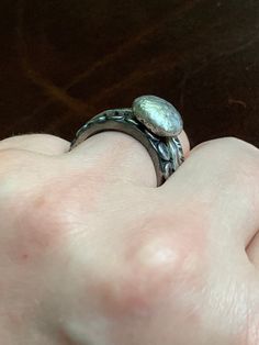 "This ring can be worn stacked comfortably with other bands or as a solitaire. It is unisex in design making it perfect for guys or gals. This ring has lots of unique texture and has been distressed for an ancient relic look and feel. Ring size 8. Band is 3mm x 2mm. The Sterling silver pebble measures approximately 9x11mm All jewelry from my studio will arrive attractively packaged and ready for gifting or keeps. Drop length 2.25\" READY TO SHIP! FREE SHIPPING! SHOP LINKS & POLICIES PLEASE R Stackable Sterling Silver Dome Ring For Promise, Stackable Sterling Silver Dome Promise Ring, Silver Stackable Dome Ring For Promise, Adjustable Stackable Dome Ring, Adjustable Double Band Sterling Silver Ring, Unique Adjustable Oval Stackable Rings, Silver Stackable Rings With Oxidized Finish For Promise, Silver Stackable Rings With Hand Forged Round Band, Oxidized Adjustable Promise Ring