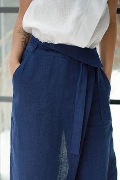 Linen Bottoms With Tie Waist For Work, Linen Tie Waist Pants For Work, Workwear Linen Pants With Tie Waist, Indigo Linen Pants With Pockets, Blue Linen Ankle-length Wide Leg Pants, Elegant Linen Bottoms With Tie Waist, High-waisted Wide Leg Linen Pants With Side Pockets, Blue Linen Wide Leg Pants For Workwear, Spring Indigo Linen Pants