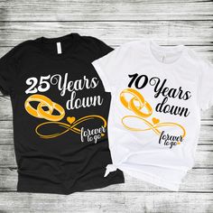 Surprise your husband/wife with this anniversary celebration tshirt. You can personalize with names if you wish. (Sold Separately) * 100% combed and ring-spun cotton (Heather colors contain polyester) * Fabric weight: 4.2 oz/yd² (142 g/m²) * Pre-shrunk fabric * Side-seamed construction * Shoulder-to-shoulder taping * Blank product sourced from Guatemala, Nicaragua, Mexico, Honduras, or the US This product is made especially for you as soon as you place an order, which is why it takes us a bit lo Anniversary Crew Neck T-shirt With Custom Print, Anniversary White Custom Print T-shirt, Anniversary T-shirt With Custom Print, Short Sleeve, Customizable Crew Neck T-shirt For Anniversary, Personalized Anniversary T-shirt, Personalized T-shirt For Anniversary, Personalized Short Sleeve T-shirt For Anniversary, Customizable Black T-shirt For Anniversary, Custom Print Black T-shirt For Anniversary