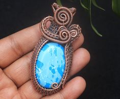 Rare Collection Larimar Turquoise Gemstone Copper Wire Wrap Pendant, Oxidize Pendant, Copper Wire Jewelry, Copper Pendant, Christmas Gift ITEM DETAILS  Item Type ~ Pendant  Gemstone Name - Larimar Turquoise Metal ~ Copper Wire  Pendant Weight Approx. ~ 39.50 Gram Pendant Size Approx~  7.6 Centimetre  Pendant Width Approx~ 3.5 Centimetre Quantity ~ 1 Piece Handmade Turquoise Chrysocolla Necklace Gift, Handmade Blue Turquoise Necklace Gift, Handmade Blue Turquoise Necklace For Gift, Blue Chrysocolla Pendant Jewelry, Unique Blue Turquoise Necklace Gift, Blue Chrysocolla Necklace For Gift, Unique Blue Turquoise Necklace As A Gift, Unique Blue Turquoise Necklace For Gift, Blue Chrysocolla Turquoise Necklace As A Gift