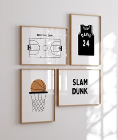 three framed basketball posters hanging on the wall