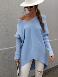 Our Clia Knit comes in a sky blue colour in an oversized drape fit. This features a heart neckline and open V back collar, batwing long fitted sleeves, and a roomy fit making this ideal for growing baby bumps. This piece is made from lightweight breathable material which is perfect for a trans-seasonal outfit. Pair with jeans for a lazy day outfit or complete the look with our Jady Rose Heels. Size Guide: Ambre is 5’2” tall, and has a 33.2” bust, 24.5”waist, & 36.7” hips. She is wearing a S / US Chic Blue V-neck Sweater, Light Blue Knit Long Sleeve Tops, Light Blue Long Sleeve Soft Knit Top, Blue Soft Knit V-neck Top, Light Blue Cozy Long Sleeve Tops, Blue Oversized Long Sleeve Sweater, Oversized Long Sleeve Blue Sweater, Chic Blue Soft Knit Sweater, Oversized Blue Long Sleeve Sweater