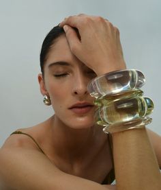 Show ’em your stack! This thin domed cuff bracelet in clear resin looks stellar worn solo or stacked together. Hoop Charms, Lizzie Fortunato, Classic Brides, Blue Topaz Stone, Bridal Belt, Fall Accessories, Topaz Stone, Green Amethyst, Fine Earrings