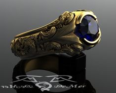 a gold ring with a blue stone in the center