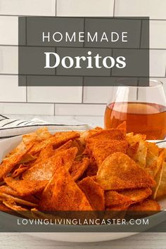 homemade tortilla chips on a plate with a glass of tea