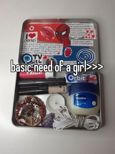 an open box with various items inside it and the words basic need of a girl