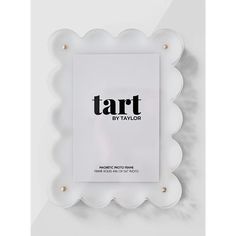 the tart by taylor logo on a white background