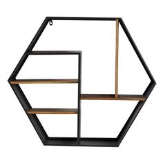 a black and gold shelving unit with shelves on each side, in the shape of hexagons