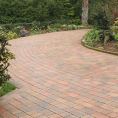 Traditional Block Paving The Chartres range of block paving has been designed to provide a traditional, olden style look and feel that works well with period and rustic properties. When laid, these blocks provide a paved surface that looks established and in keeping with traditional and period surroundings. Kerbside Appeal Chartres Paving Blocks provide a beautiful paved surface, ideal for driveways, footpaths and patio areas in your garden. The aesthetic quality of these blocks will certainly add to the looks of your property. A beautiful driveway can add up to 10% to the value of your home, so Chartres blocks are a great way to maximise this potential.  Driveway Paving Chartres Block Paving has been created to specifically meet the needs of domestic driveways and parking areas. The block Large Driveway Ideas, Block Paving Patio, Concrete Block Paving, Paving Garden, Entrance Landscaping, Driveway Blocks, Beautiful Driveways, Driveway Entrance Landscaping, Paving Ideas