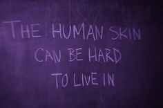 a blackboard with writing on it that says the human skin can be hard to live in